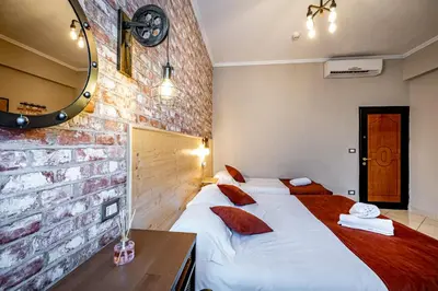 Letto o letti in una camera di HOTEL VENETO Centro Storico di Firenze