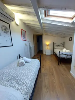 Letto o letti in una camera di Alloggi Palmini