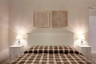 Letto o letti in una camera di Lambert Apartment