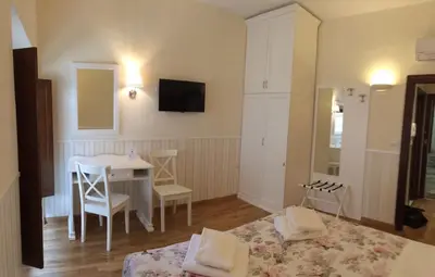 Letto o letti in una camera di Relais Campanile Adelaide