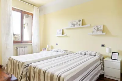 Letto o letti in una camera di Gavinana Apartment by Mmega