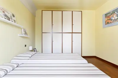 Letto o letti in una camera di Gavinana Apartment by Mmega