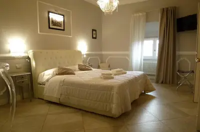 Letto o letti in una camera di Brunelleschi suite
