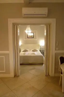 Letto o letti in una camera di Brunelleschi suite