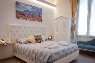 Letto o letti in una camera di Magnifico Florence Luxury