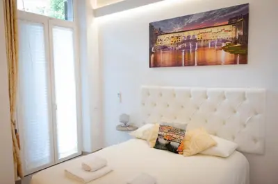Letto o letti in una camera di Magnifico Florence Luxury