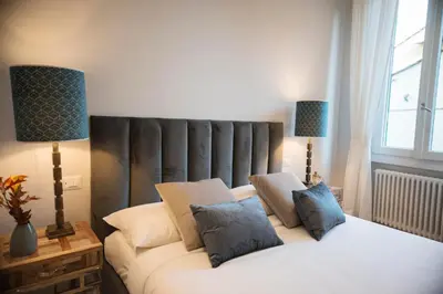 Letto o letti in una camera di Apartments Florence Oblate Exclusive View