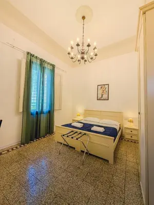 Letto o letti in una camera di L'Aranceto&stilnovo