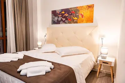 Letto o letti in una camera di Florence Rooms Novella