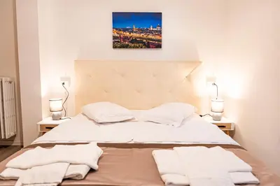 Letto o letti in una camera di Florence Rooms Novella