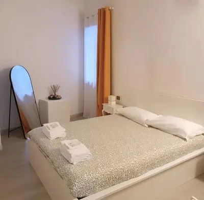 Letto o letti in una camera di Handy House