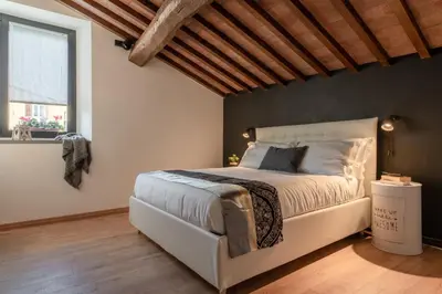 Letto o letti in una camera di Santa Trinita - Flo Apartments