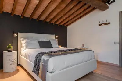 Letto o letti in una camera di Santa Trinita - Flo Apartments