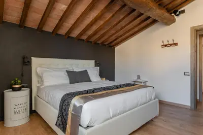 Letto o letti in una camera di Santa Trinita - Flo Apartments