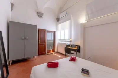 Letto o letti in una camera di Ground Floor With Patio-Ghibellina 65