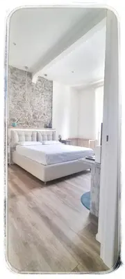 Letto o letti in una camera di Leopolda Suite