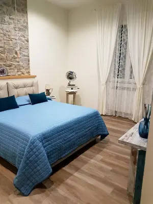 Letto o letti in una camera di Leopolda Suite