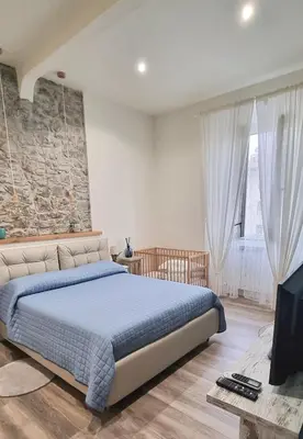 Letto o letti in una camera di Leopolda Suite