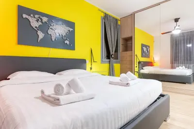 Letto o letti in una camera di GuestHost - Colorful Boccaccio Apartment