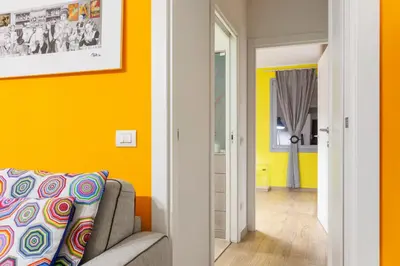 Area soggiorno di GuestHost - Colorful Boccaccio Apartment