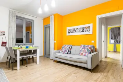 Area soggiorno di GuestHost - Colorful Boccaccio Apartment