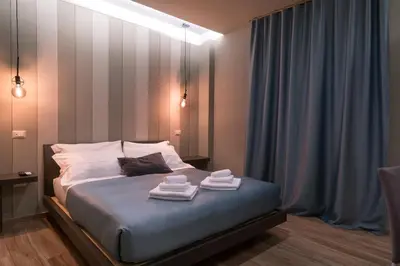 Letto o letti in una camera di GOGO` Petit Hotel