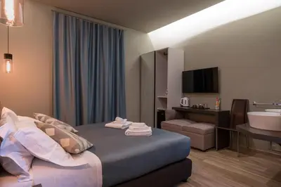 Letto o letti in una camera di GOGO` Petit Hotel