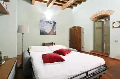 Letto o letti in una camera di Across The River