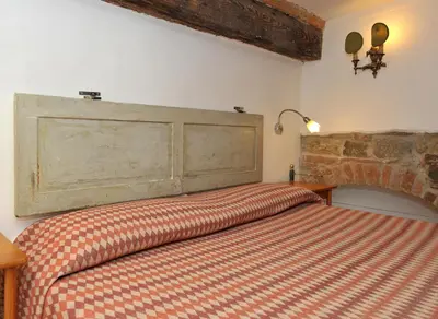 Letto o letti in una camera di Florence Rental