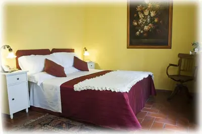 Letto o letti in una camera di Florence Rental