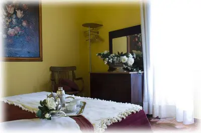 Letto o letti in una camera di Florence Rental