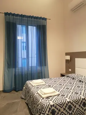Letto o letti in una camera di Affittacamere Ramazzini