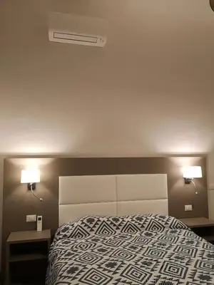 Letto o letti in una camera di Affittacamere Ramazzini