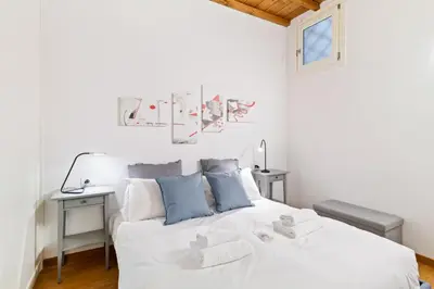 Letto o letti in una camera di GuestHost - Florence City Center Flat Via Dei Neri