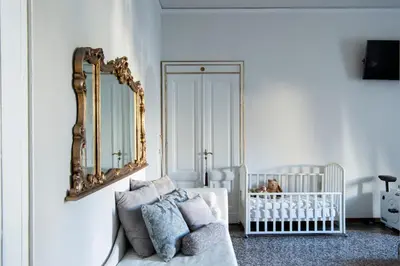 Letto o letti in una camera di Contemporarys Suites