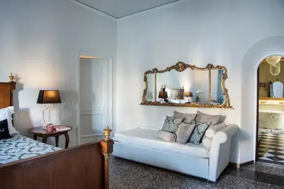 Letto o letti in una camera di Contemporarys Suites