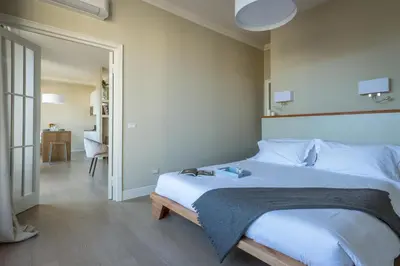 Letto o letti in una camera di Residenza Il Conte Rosso