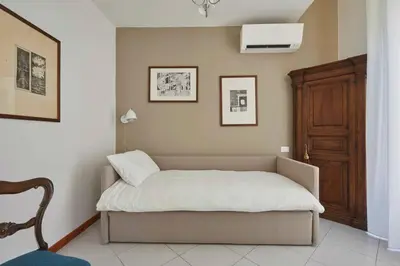 Letto o letti in una camera di Suite Home Firenze