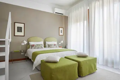 Letto o letti in una camera di Suite Home Firenze