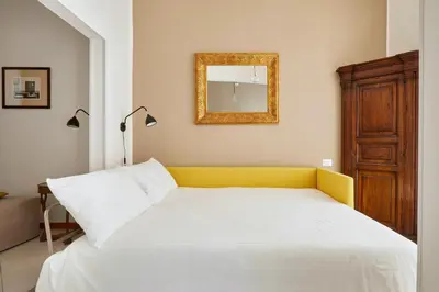 Letto o letti in una camera di Suite Home Firenze