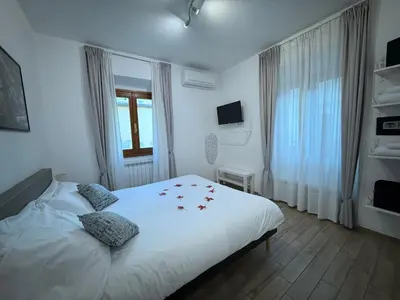 Letto o letti in una camera di SuperCentral Suite Venus Dome View lift e AC 2 plus 2