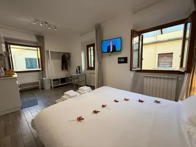 TV o dispositivi per l'intrattenimento presso Dream holiday Suite David with Dome View lift & AC