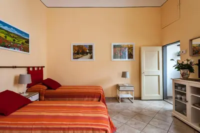 Letto o letti in una camera di All' Ombra Del Duomo