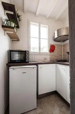 Cucina o angolo cottura di All' Ombra Del Duomo