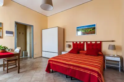 Letto o letti in una camera di All' Ombra Del Duomo