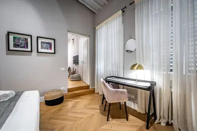 Letto o letti in una camera di Hs4U Ricasoli Luxury apartment near Duomo N.1