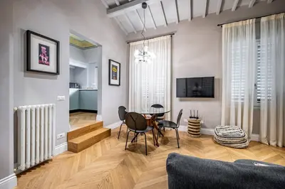 Area soggiorno di Hs4U Ricasoli Luxury apartment near Duomo N.1