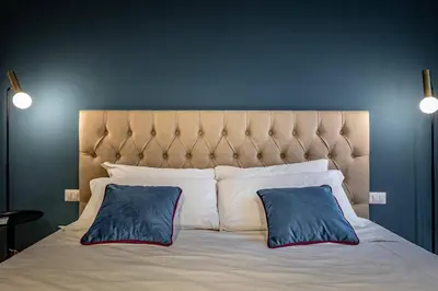 Letto o letti in una camera di Hs4U Ricasoli Luxury apartment near Duomo N.2