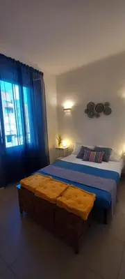Letto o letti in una camera di Charming & spacious Florentine home just two mins from tram stop