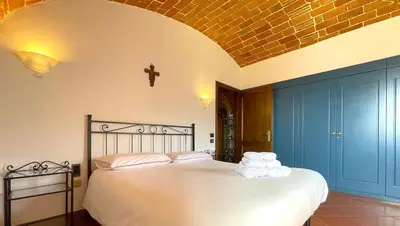 Letto o letti in una camera di Brucina - Private holiday apartment with shared pool